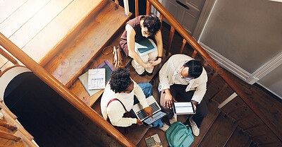 Buy stock photo Students, laptop and assignment in university with collaboration, stats course and business school. Above, people and study group on stairs with tech, data analytics and AI for college education.