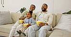 Family, laughing and watching tv with popcorn in home for entertainment or online streaming on sofa. Mom, dad or child eating with smile for comedy movie, subscription or humor together in house