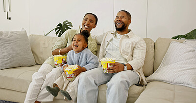 Buy stock photo Family, laughing and watching tv with popcorn in home for entertainment or online streaming on sofa. Mom, dad or child eating with smile for comedy movie, subscription or humor together in house