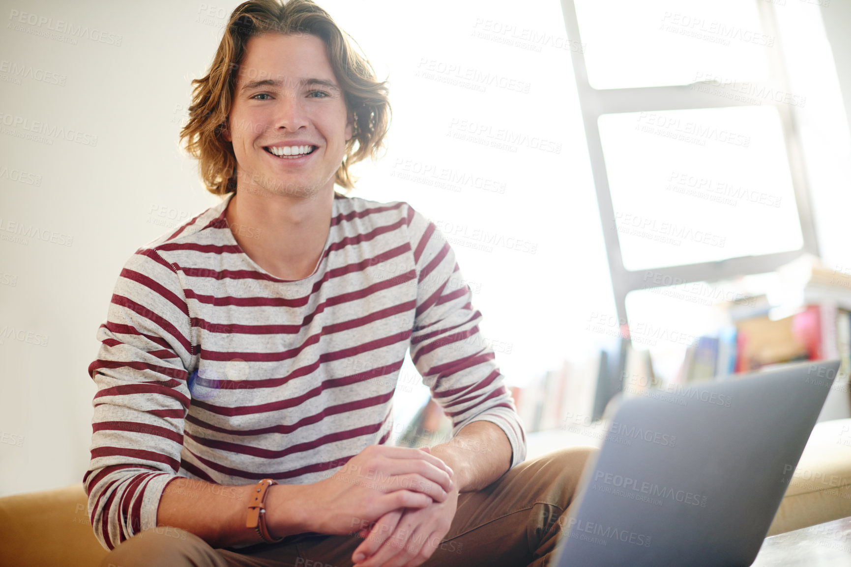 Buy stock photo Portrait, happy man and university student in home for elearning or knowledge with laptop. Computer, college and remote education with person in living room for study, smile and scholarship in USA