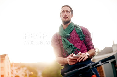 Buy stock photo Thinking, phone or man on outdoor bike for eco friendly transport, commute or city travel. Search, space and male person in urban town with location, mobile app or bicycle for online directions