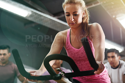 Buy stock photo Health, bike and woman in spin class for fitness, training exercise and wellness in gym. Athlete, cardio or female person on aerobic machine for workout endurance, body or cycling equipment in club
