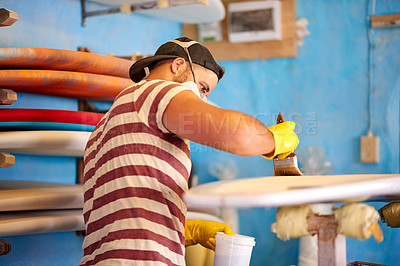 Buy stock photo Painting, man and surfboard in workshop for restoration, project tools or manufacturing. Production, painter or creative wooden craft in small business for surfing equipment or renovation process
