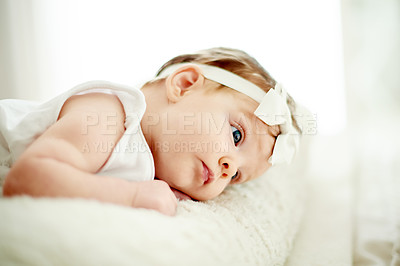Buy stock photo Relax, calm and infant on bed for brain growth, process new information and house. Rest, cognitive evolution and baby girl in nursery, observe surrounding and movement for sensory development
