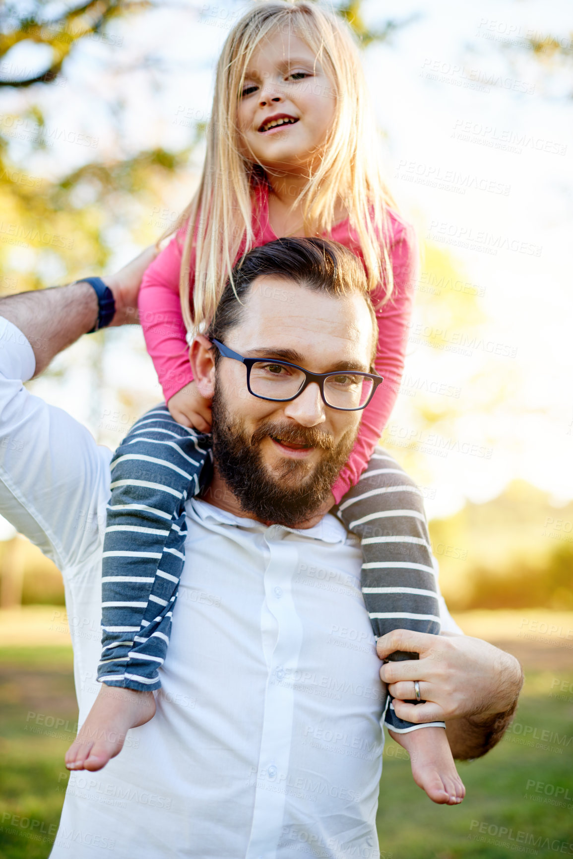 Buy stock photo Portrait, father and child on shoulders at park for travel, playful fun and bonding together on holiday. Man, smile and carry kid with love, balance support and vacation with games to explore nature