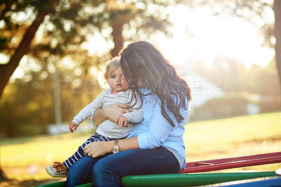 Buy stock photo Portrait, kiss and mom with child, playground or affection for toddler in nature or break with girl. Woman, love and fun with daughter on weekend, family and childcare on holiday, park and outdoor