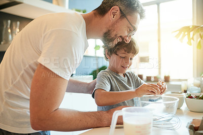 Buy stock photo Baking, bonding and father with kid in kitchen in home with learning, fun and activity together. Connection, flour and dad with boy child for cooking recipe in morning for weekend hobby in house.