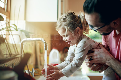 Buy stock photo Kitchen, washing hands or water with father and daughter in home together for hygiene or safety. Cleaning, sink or tap with girl child and single parent man in apartment to remove bacteria or germs