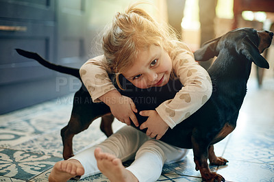 Buy stock photo Hug, girl child and dog in portrait for bonding together, growth and connection with companion. Happiness, toddler and animal care in house with empathy, loyalty and love for childhood development.