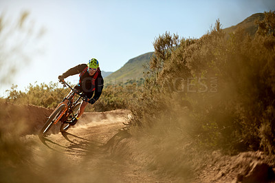 Buy stock photo Mountain, cycling and man with bike on dirt road race, workout or cardio exercise in nature. Fitness, triathlon and cyclist on dust trail for sports competition, challenge or training with adventure.