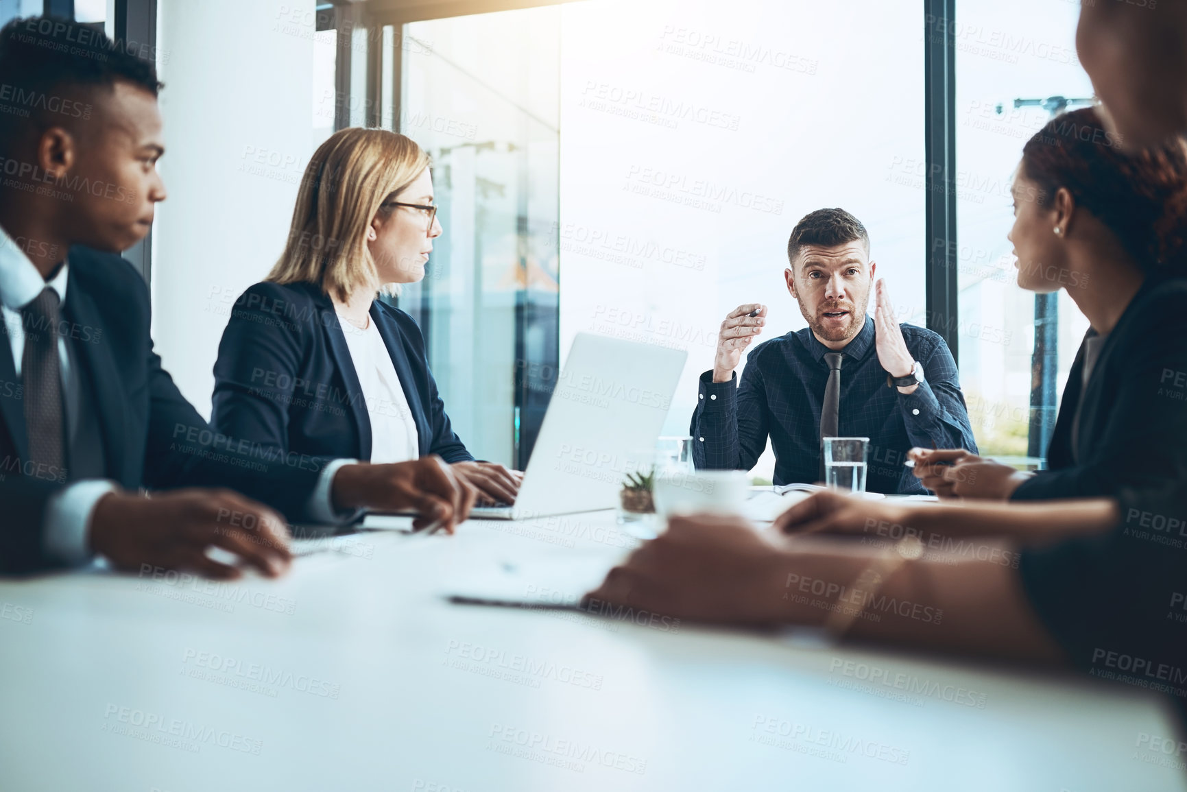 Buy stock photo Businessman, group and discussion in boardroom, briefing and planning with attention in meeting. Collaboration, team leader and explain with listening, strategy and talking for project in office