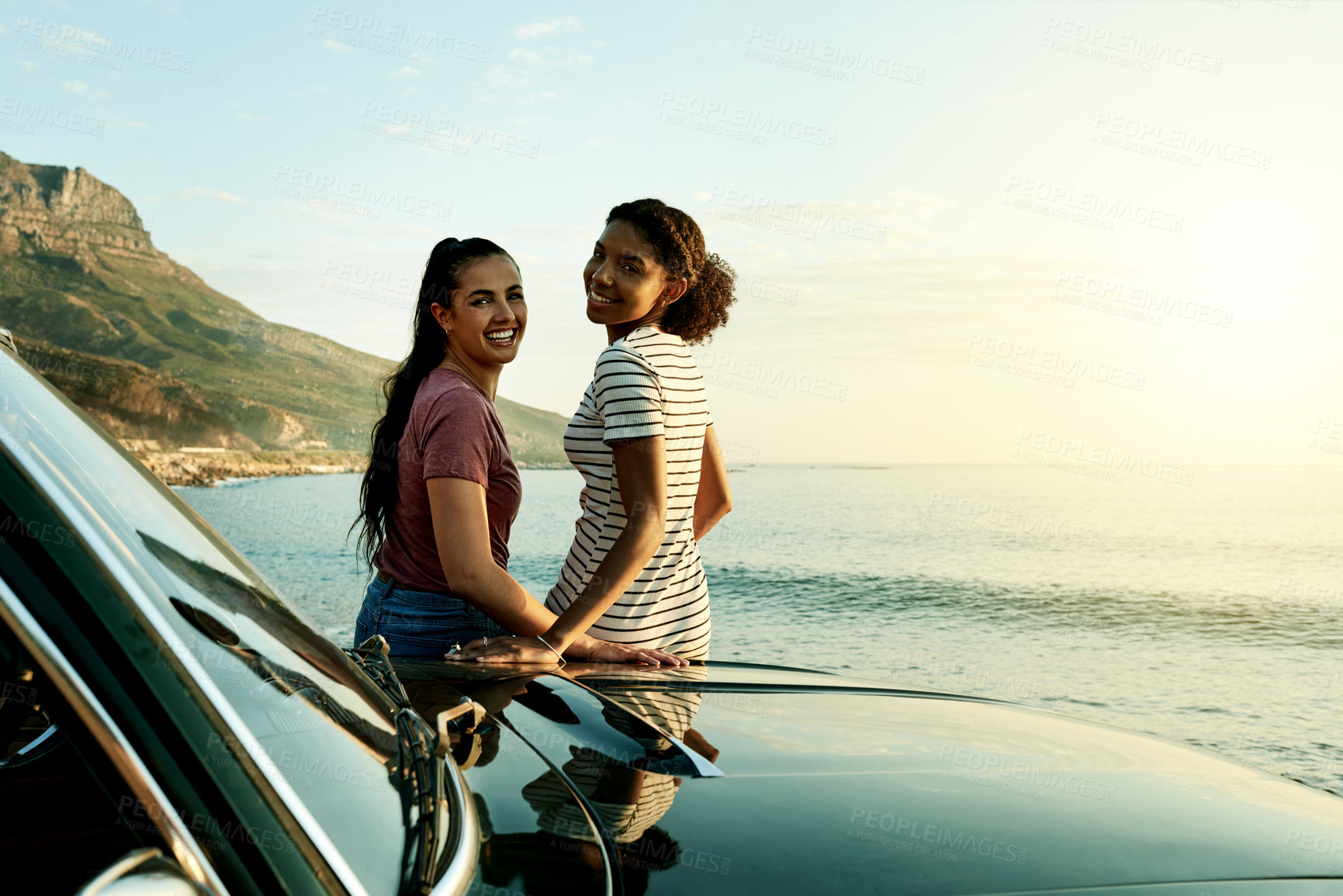 Buy stock photo Happy women, portrait and friends with car for road trip, adventure or sightseeing journey together. Female people, holiday or bonding with vehicle for outdoor travel or ocean coast view on space