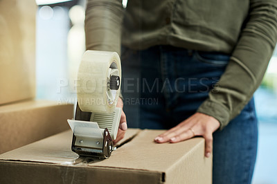 Buy stock photo Moving, hands and tape for boxes, home and preparing for new start, packing and property investment. Relocation, cardboard and milestone for person, mortgage and approved loan for house or apartment