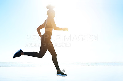 Buy stock photo Fitness, woman and running at beach for training, body wellness and health with mockup space. Ocean, runner or cardio exercise outdoor for endurance challenge, workout and energy with flare in nature