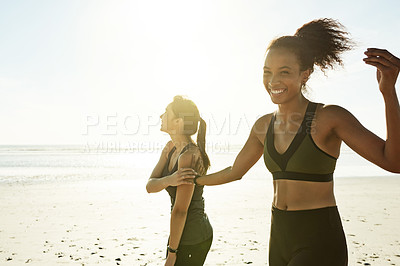Buy stock photo Smile, friends and relax with women on beach for fitness, training break and bonding together. Space, people and laughing for exercise joke, sports commitment and recovery from workout for wellness