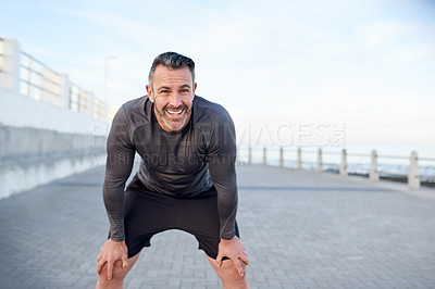 Buy stock photo Mature, man and workout break outdoor with fitness fatigue, exhausted and tired of running challenge. Space, runner and resting at promenade with exercise burnout, endurance and recovery from cardio