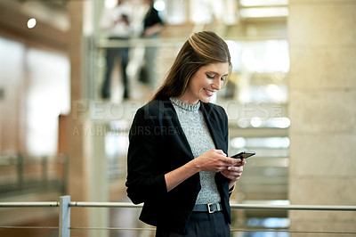 Buy stock photo Happy woman, phone and texting at office, scroll and funny meme on break at media agency. Person, journalist and laugh with smartphone, mobile app and joke with social network post at workplace