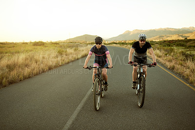 Buy stock photo Cycling, fitness and couple with bicycle, nature or active for wellness, space and helmet for ride. Healthy, athlete and people with eco friendly transport, travel and exercise with bike and outdoor