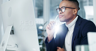 Buy stock photo Thinking, man or reading computer in office for trade decision, risk assessment or monitor news. Glasses, black stock broker or tech for market insight, check economic calendar or solution with flare