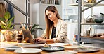 Happy, woman and pottery in small business with laptop, good news or online order for art commission. Entrepreneur, person and typing in ceramics shop with computer, website or seller of clay product