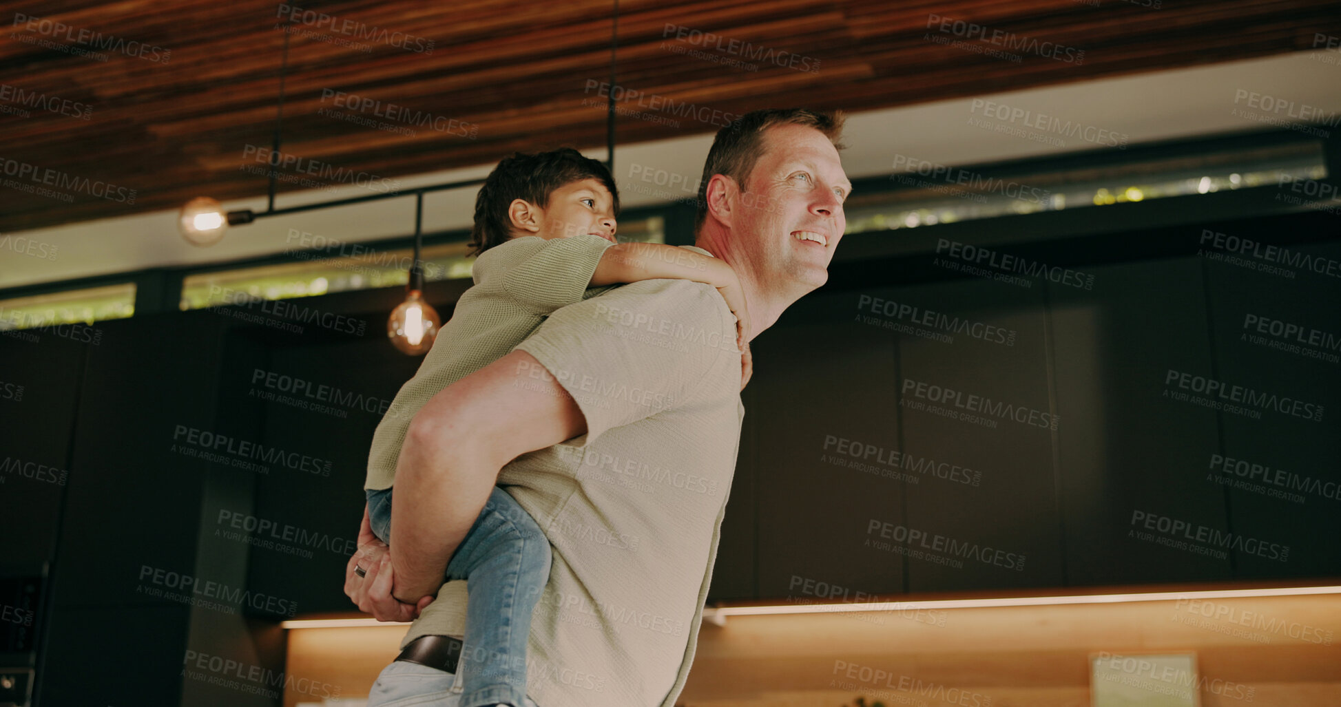 Buy stock photo Father, love and piggyback with child in home for support, quality time and bonding with smile. Happy boy, dad and carry in family house together for care, play or security with parent connection