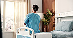 Back, thinking and woman in hospital bed for surgery recovery, cancer diagnosis and treatment. Healthcare, clinic and person with reflection, thought and waiting for results, update and health news