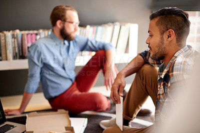 Buy stock photo Creative, thinking and business men in office for project, author or writer in startup. Team, problem solving or collaboration at work with idea, insight or inspiration for story with tablet on floor