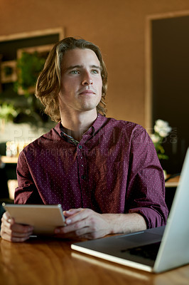 Buy stock photo Thinking, remote work and man with tablet, cafe and creative for digital magazine, app and employee. Reflection, reporter and person with tech for article, online or freelance project in coffee shop