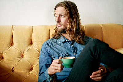 Buy stock photo Coffee, thinking and man on sofa, cafe and relax with break, space and reflection with daydreaming. Person, customer and guy on couch, cappuccino and herbal tea with contemplation and decision