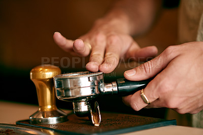 Buy stock photo Coffee beans, press and hands of barista in cafe for hospitality, espresso machine and server. Caffeine roast, latte brew and drink with closeup of person in cafeteria for beverage and cappuccino