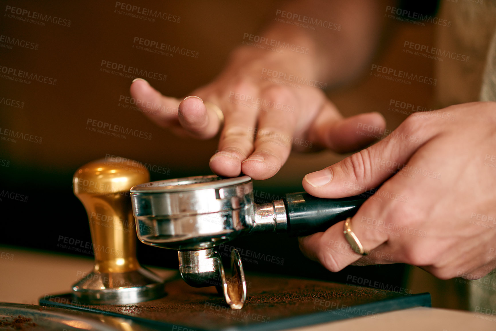 Buy stock photo Coffee beans, press and hands of barista in cafe for hospitality, espresso machine and server. Caffeine roast, latte brew and drink with closeup of person in cafeteria for beverage and cappuccino