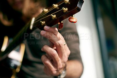 Buy stock photo Music, guitar and song with hands of man in home for performance, band practice and production. Musician, acoustic instrument and creative artist with person in apartment for sound and entertainment