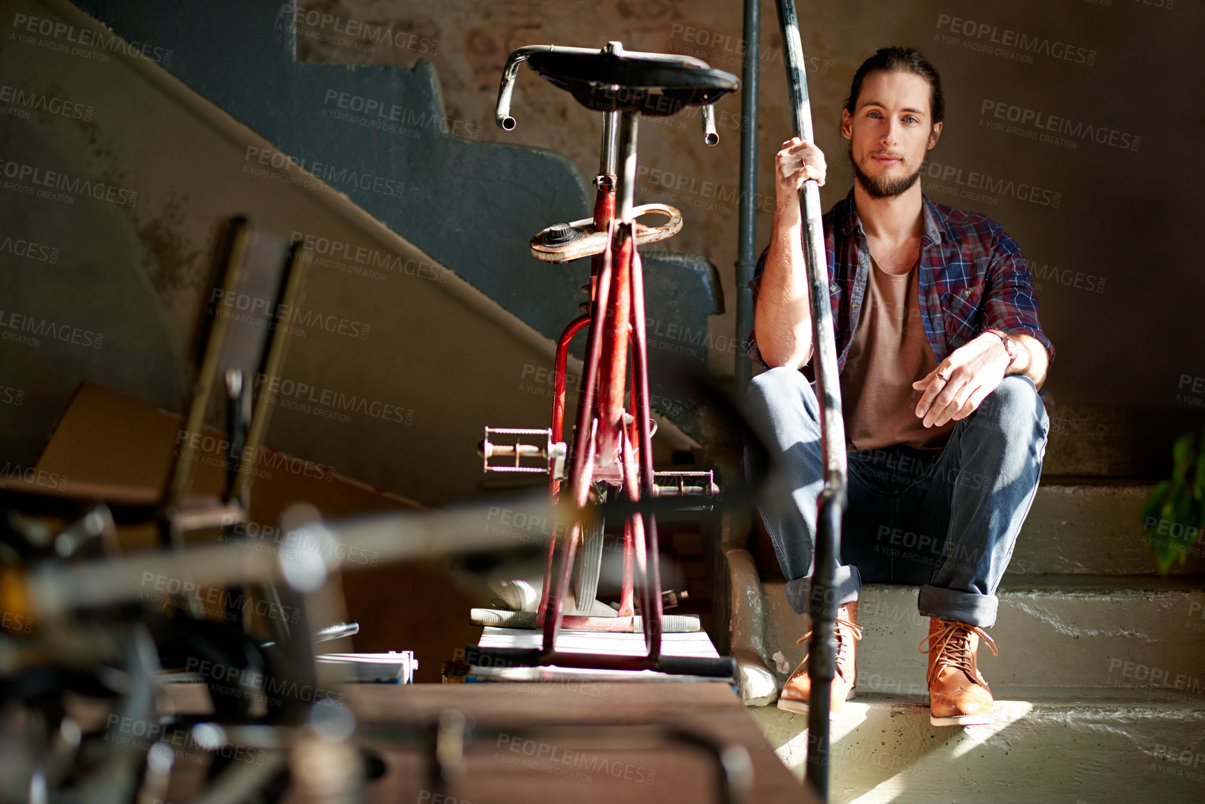 Buy stock photo Portrait, garage and man with tools, bike repair and maintenance with skills, tools and workshop. Person, entrepreneur or business owner with restoration expert, fixing or bicycle with equipment