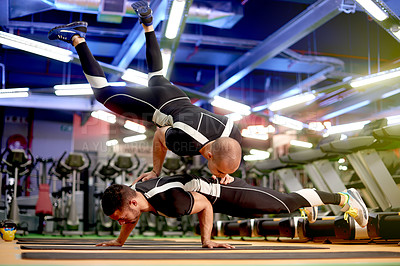 Buy stock photo Breakdance, acrobatic or dancers in studio for teamwork, calisthenics training or workout. Athlete, strong or flexible people in club with stability for balance, acrobatics skill or dancing on floor