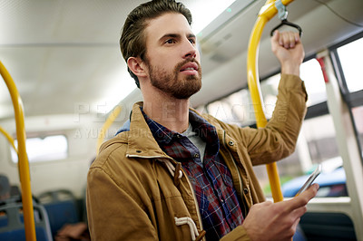 Buy stock photo Thinking, man and handle for travel on bus to check location, public transport and transit journey. Passenger, thoughts and phone for shuttle service, urban trip and traffic delay of morning commute