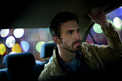 Buy stock photo Night, man and thinking in taxi for travel, journey or transport service with bokeh. Passenger, late ride or relax in cab with sightseeing, city nightlife or holiday trip for town experience in Italy