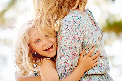 Buy stock photo Portrait, mother and happy child outdoor with hug, connection and support for bonding together. Smile, girl and parent in nature with embrace, care and childhood memory on weekend break in Australia