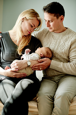 Buy stock photo Happy, connection and parents with baby in home with calm, care and love in family time. Bonding, smile and newborn sleeping with mother and father for support, comfort or trust together in house.