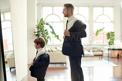 Buy stock photo Home, father and boy with mirror, clothes and help with suit, event preparation and family. Apartment, parent or dad with son, child development or learning fashion or kid with formal or dressing
