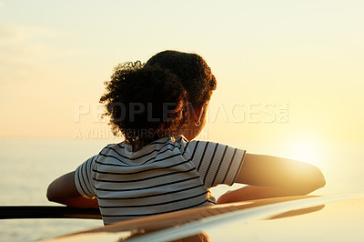 Buy stock photo Sunrise, thinking and back of woman by car for road trip, adventure and travel destination by ocean. Morning, relax and person by vehicle outdoor for holiday, summer vacation and journey by seaside