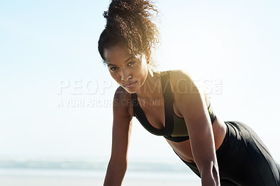 Buy stock photo Fitness, portrait and push up with woman on beach for balance, power or physical challenge. Exercise, serious and space with African athlete on blue sky for improvement, strength training or workout