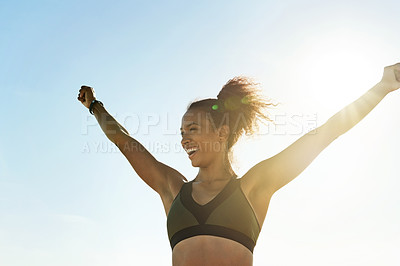 Buy stock photo Outdoor, excited and black woman with achievement in fitness, pride and commitment in morning training. Happy, accomplishment and athlete with arms up in goal success, flare and space on blue sky.