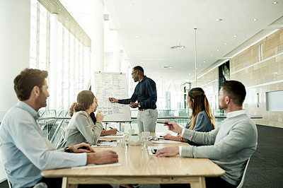 Buy stock photo Boardroom, team and man with whiteboard, meeting or speaker with group, presentation and discussion. Business, presenter and training session for people, sales manager and planning with colleagues