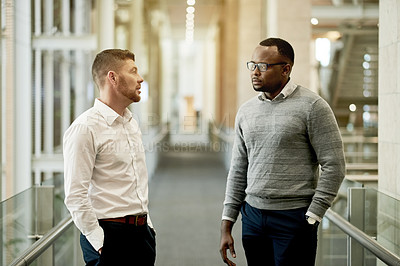 Buy stock photo Business, men and discussion in office hallway for financial performance, market feedback and update. Finance team, employees and conversation at workplace for project management and industry trends