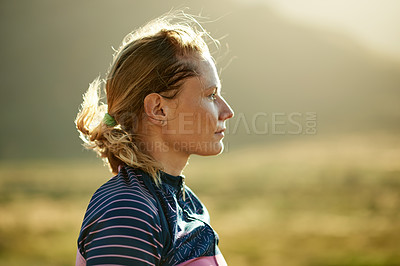 Buy stock photo Woman, fitness and thinking with fresh air in nature for cycling tour, sport or outdoor exercise. Active, female person or profile of cyclist contemplating route, daydreaming or space in countryside