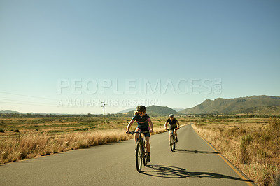 Buy stock photo Cycling, fitness and workout with couple in nature for wellness, race team and cardio. Exercise, training and bike with man and woman in countryside road for mockup, sports and bicycle space