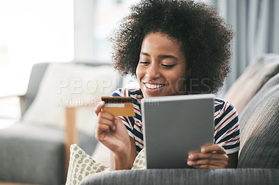 Buy stock photo Happy, black woman and credit card with tablet for ecommerce or payment on sofa in home. Female person, shopper or user with smile, debit or technology for online shopping or remote banking in house