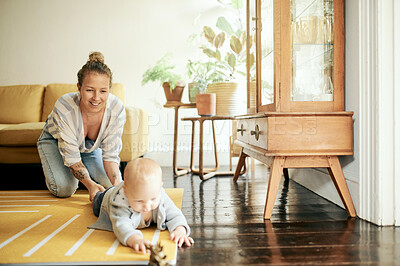 Buy stock photo Living room, play and mama and baby with toys in home for bonding, quality time and relax together. Family, love and happy mother with kid playing for child development, care and happiness on floor