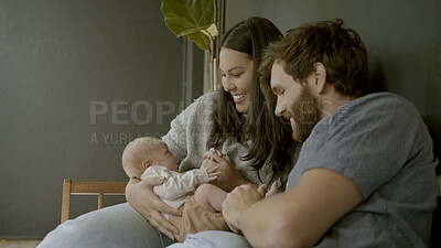 Buy stock photo Home, mom or dad with baby in a happy family to relax or bond together for child development. Love, hug or proud father with an excited mother or newborn infant for support, trust or comfort on couch