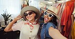 Friends, selfie and happy women with sunglasses in shopping mall, post and picture for social media. Fashion, photography and people with hat, laughing and content creation for influencer discount